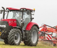 Case_IH_Maxxum_115_with_windrower.jpg